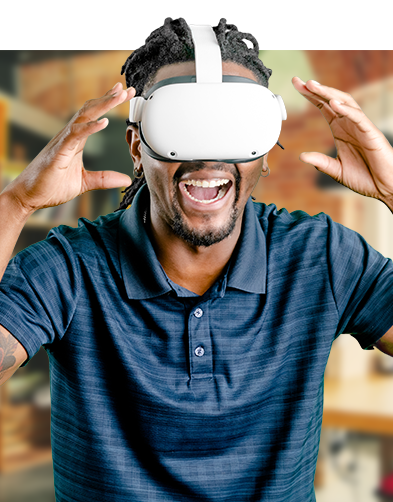 A man wearing a virtual reality headset doing online skilled trades training through gamification