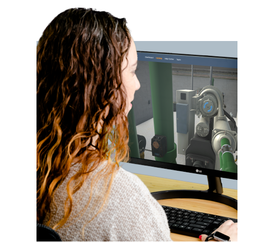 A woman using a computer for simulation-based commercial HVAC training