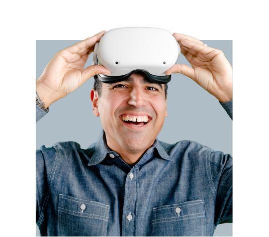 A man with a virtual reality headset on his forehead using it for online HVAC training