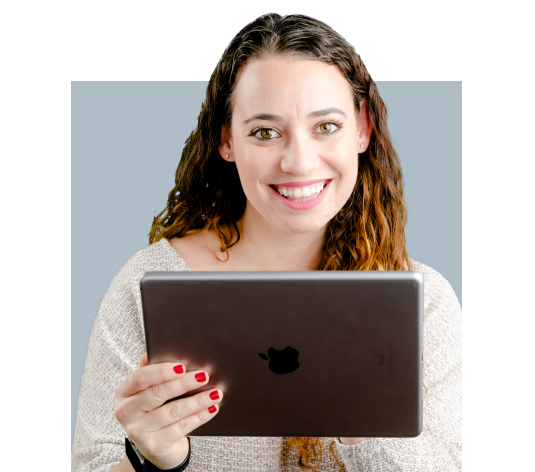 A woman holding a laptop in front of her face using it for online facilities maintenance trainning