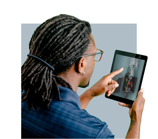 A man with dreadlocks doing a facilities maintenance training course on a tablet