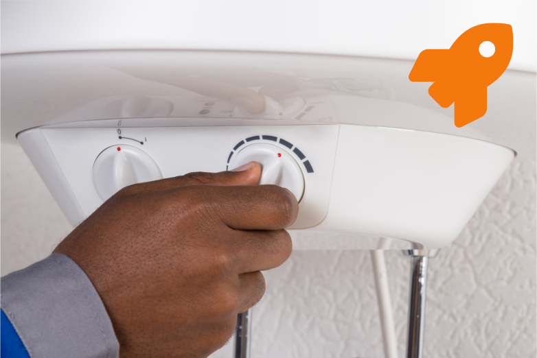A water heater professional adjusting a know on a water heater
