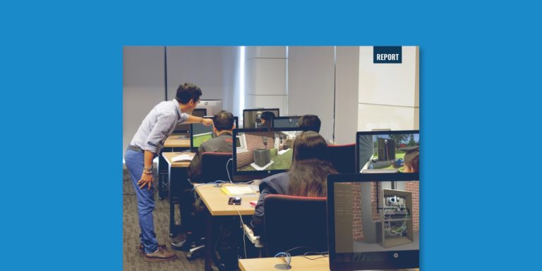 A classroom of students on computers doing simulation training at a technical college