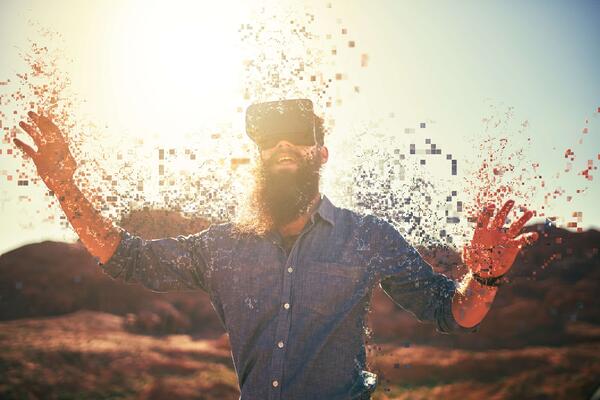 A man with a beard wearing a virtual reality headset