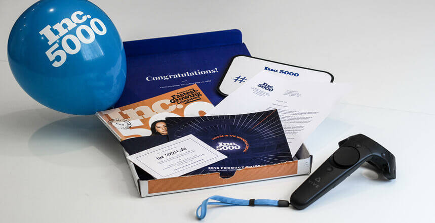 A blue balloon, a pair of scissors, a book, and a pair of scissors.