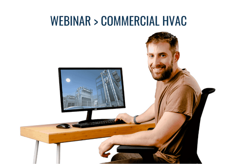 A man sitting at a desk infront doing an online course for commercial hvac training