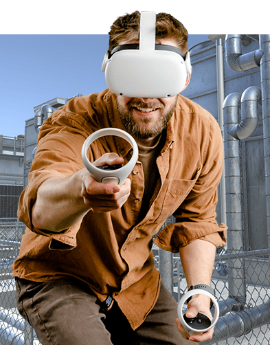 A man wearing a virtual reality headset, holding a controller using it for online hvac training