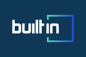 A blue and white logo with the word Built In