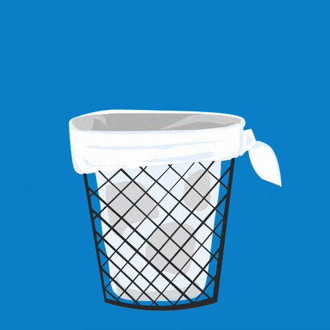 A GIF of paper being thrown into a waste basket