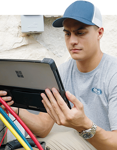 A man using a tablet for a registered apprenticeship program