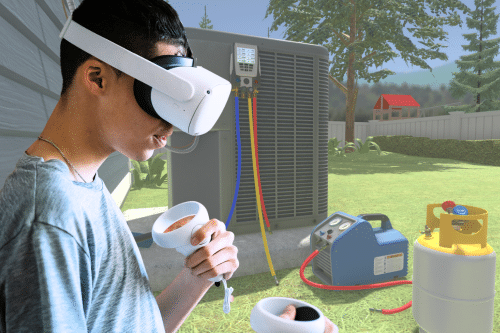 A young man using a 3D simulation for hvac training