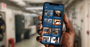 a person holding a cell phone in their hand